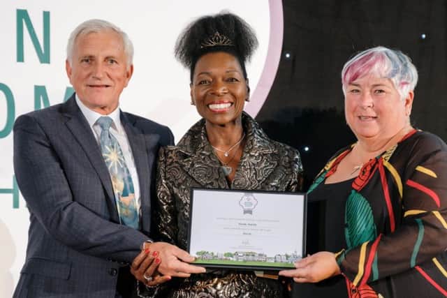 Pictured from left is Andrew Brown who is on the management team of Ravenscraig Walled Garden as well as on the Growing Kirkcaldy committee, Baroness Floella Benjamin, who presented the awards and Judith Kerr. Pic: RHS/Richard Dawson.   RHS Britain in Bloom Awards 2019 which was held at the RHS Lindley Hall on Friday 25th October 2019...Pictured is Kirkcaldy (Scotland) - Silver Gilt Award in the Small City Category with Baroness Floella Benjamin. Photography by Richard Dawson ABIPP. Vision2photo Photography. 23 Leigh Road. Andover. Hampshire. SP10 2AP. Tel 07946 590988. Email richard@vision2photo.co.uk.www.vision2photo.co.uk.