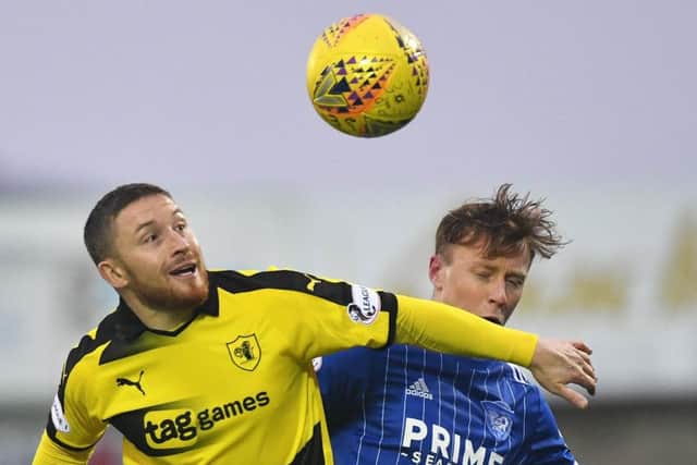 Raith's John Baird clashes with Scott Hooper