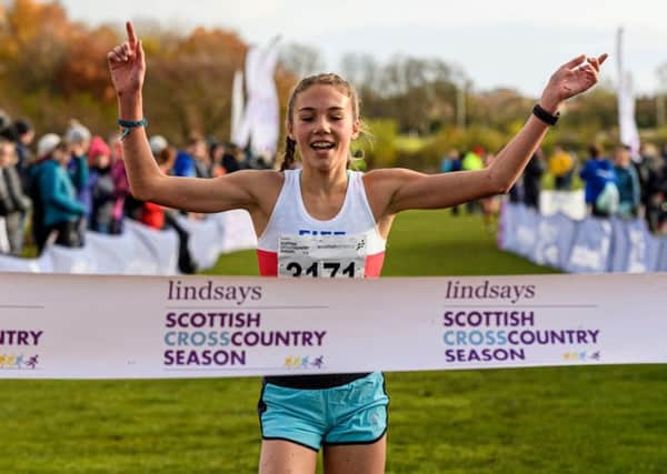 Anna Hedley takes first place at the Scottish Short Course Cross Country Championships in Kirkcaldy.