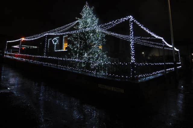 Lights on a giant Christmas tree outside Society were switched on. Pic: Fife Photo Agency.