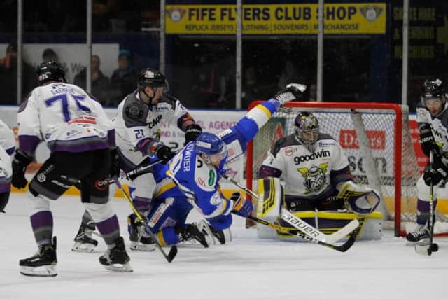 Tim Crowder takes a tumble against Manchester Storm last weekend.