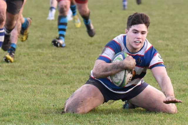 Fraser Allan completes his hat trick of tries. Pic by Chris Reekie.