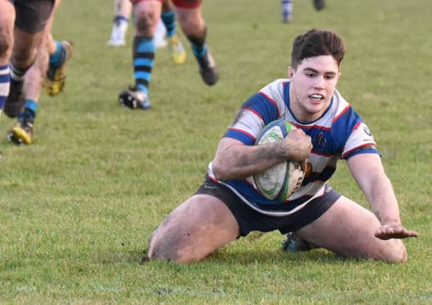 Fraser Allan completes his hat trick of tries. Pic by Chris Reekie.