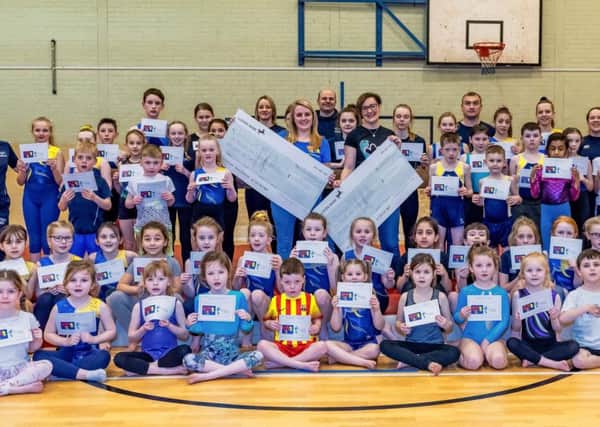 Kirkcaldy Gymnastics Club raised a fantastic £2318.40  which was split between Megan's Journey and Love Oliver.  Kelly Clarkson from Megans Journey and Jennifer Gill from Love Oliver visited a training session recently to learn more from the gymnasts and thank them in person. Pic: John Pow.