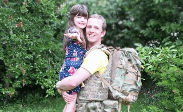 Army Major Chris Brannigan, 40, is raising money to fund research into Cornelia de Lange Syndrome (CdLS), a rare genetic condition his eight-year-old daughter Hasti was born with (Photo: JustGiving)